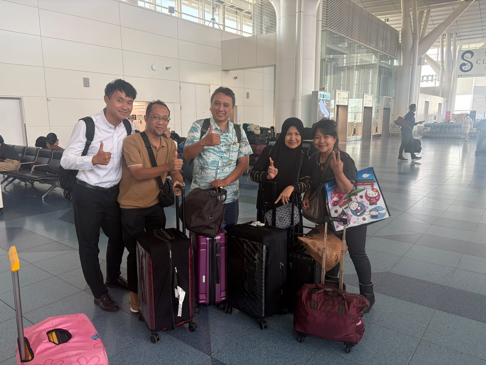 Group with luggage at the airport